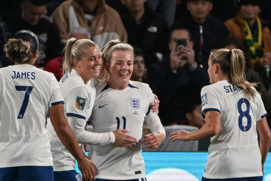 Lauren Hemp (2nd R) celebrates scoring her team's second goal