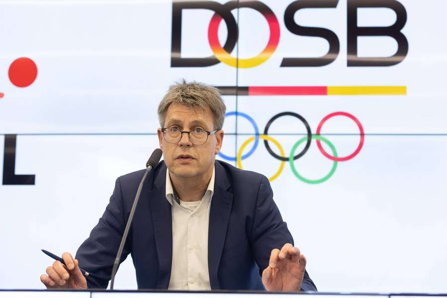 O Presidente do DOSB, Thomas Weikert, congratula-se com o novo recorde