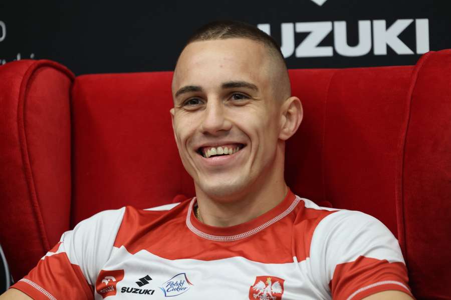 Damian Durkacz podcza konferencji prasowej przed PŚ w Warszawie 