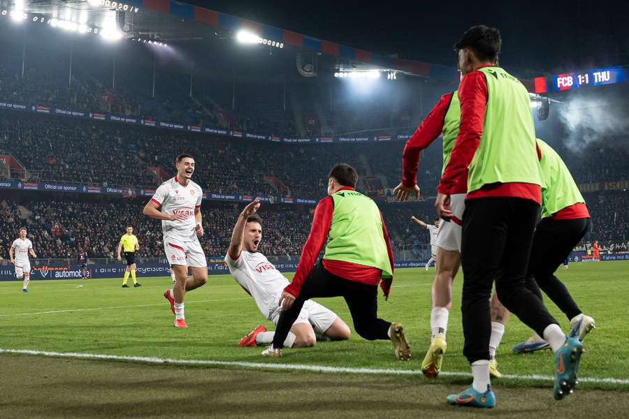Valmir Matoshi of Thun celebrates with teammates
