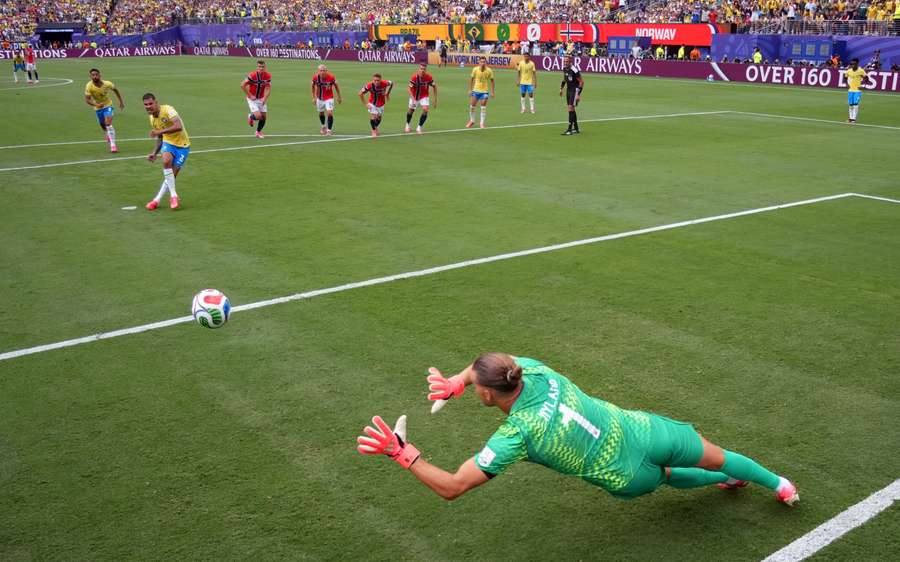 Norway's Orjan Nyland saves a penalty missed by Brazil's Bruno Guimaraes