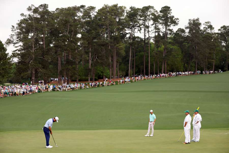 Louis Oosthuizen putts on the second green