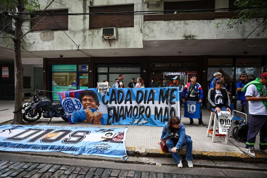 Fans of Diego Armando Maradona gather in Buenos Aires on the day of the court case against people charged with his death