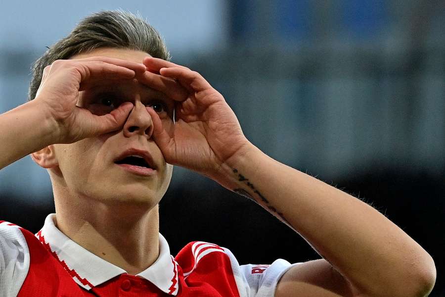 Arsenal's Belgian midfielder Leandro Trossard celebrates scoring the opening goal 