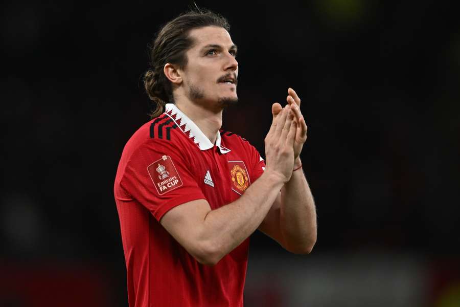 Manchester United's Austrian midfielder Marcel Sabitzer applauds fans on the pitch