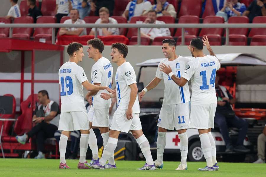 Tasos Bakasetas of Greece celebrates after scoring against Belarus in the World Cup qualifier