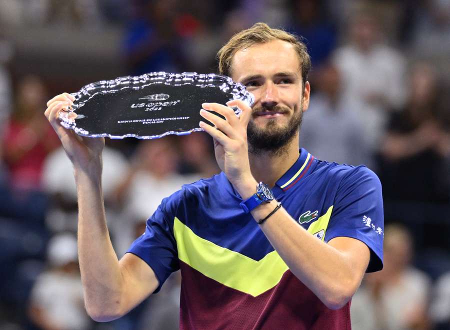 Russia's Daniil Medvedev poses dring the trophy ceremony after losing the US Open tennis tournament men's singles final match to Serbia's Novak Djokovic Russia's Daniil Medvedev poses dring the trophy ceremony after losing the US Open tennis tournament men's singles final match to Serbia's Novak Djokovic