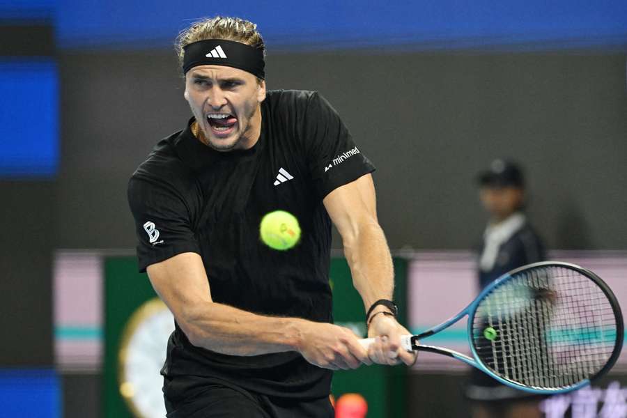 Alexander Zverev hits a return to Lorenzo Sonego in Beijing
