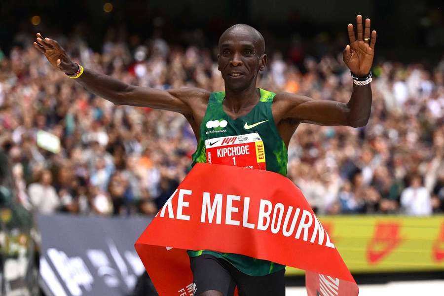 Eliud Kipchoge crosses the line to win the Melbourne Marathon Eliud Kipchoge crosses the line to win the Melbourne Marathon