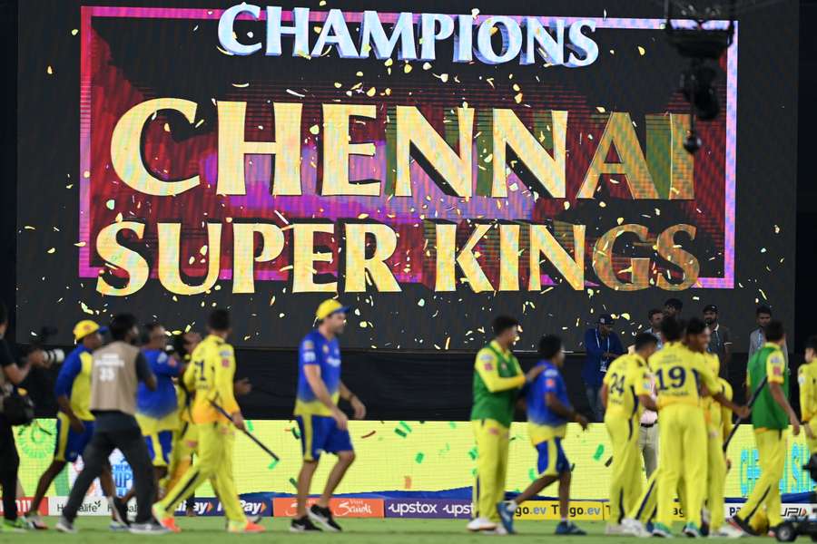 Chennai Super Kings' players celebrate their win at the end of the Indian Premier League (IPL) Twenty20 final cricket match between Gujarat Titans and Chennai Super Kings