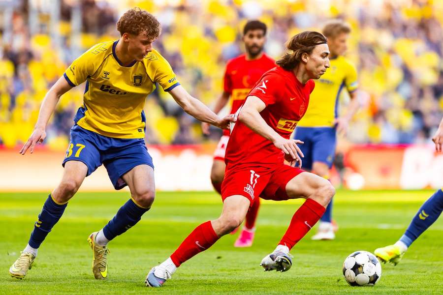 Alexander Lind and Brondby's Raphael Canut (37) in action during the 3F Superliga match