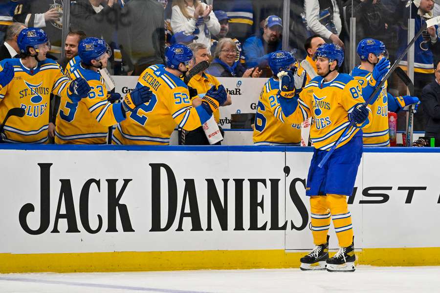 St. Louis Blues left wing Buchnevich is congratulated by teammates after scoring against the Calgary Flames