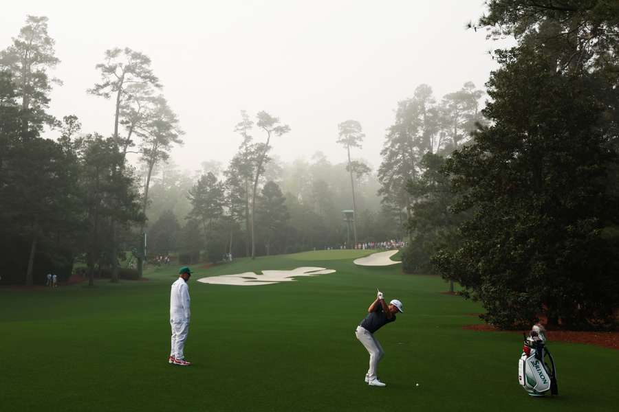 Keegan Bradley plays a shot on the tenth hole