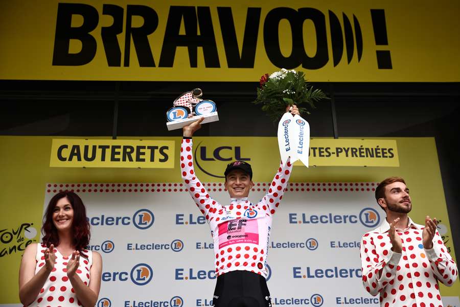 EF Education - Easypost's Neilson Powless celebrates on the podium with the best climbers' dotted jersey