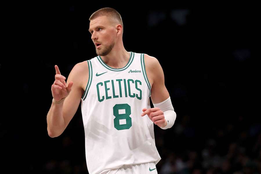 Kristaps Porzingis of the Boston Celtics celebrates a three-point shot during the second half against the Brooklyn Nets