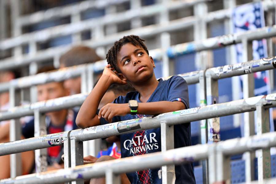 A young Paris Saint-Germain fan ahead of the UEFA Super Cup match against Aston Villa