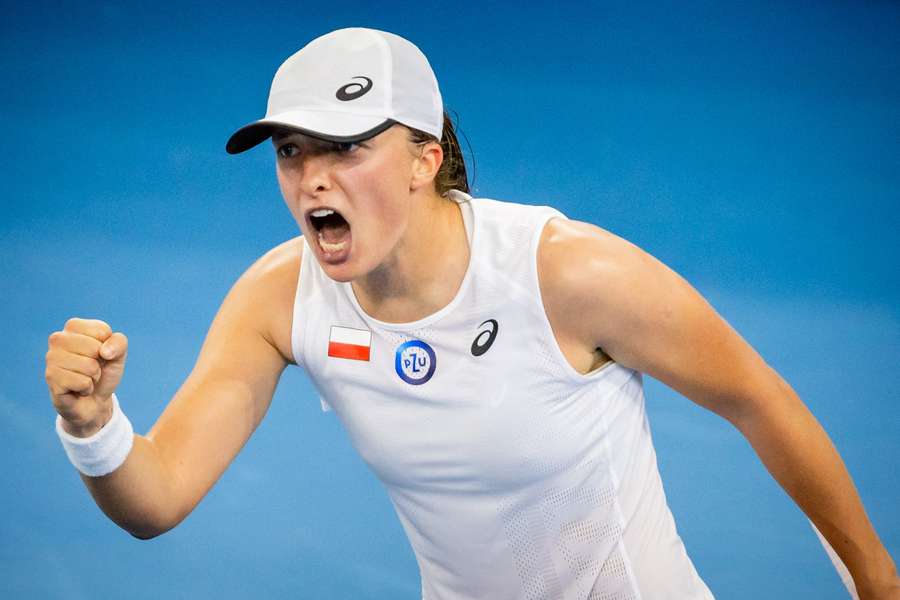 Poland's Iga Swiatek celebrates her victory against Italy's Martina Trevisan