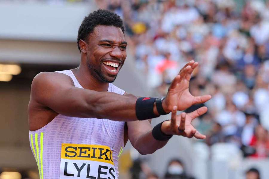 Noah Lyles strikes the 'Kamehameha' pose from the Japanese cartoon "Dragon Ball" after winning the men's 100 meters final
