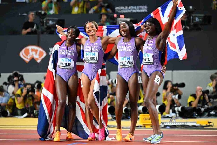 Asha Philip, Imani Lansiquot, Bianca Williams and Daryll Neita celebrate winning bronze in the women's 4x100m relay
