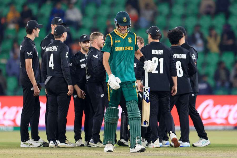 South Africa's Marco Jansen walks back to the pavilion after losing his wicket, LBW off the bowling of New Zealand's Glenn Phillips