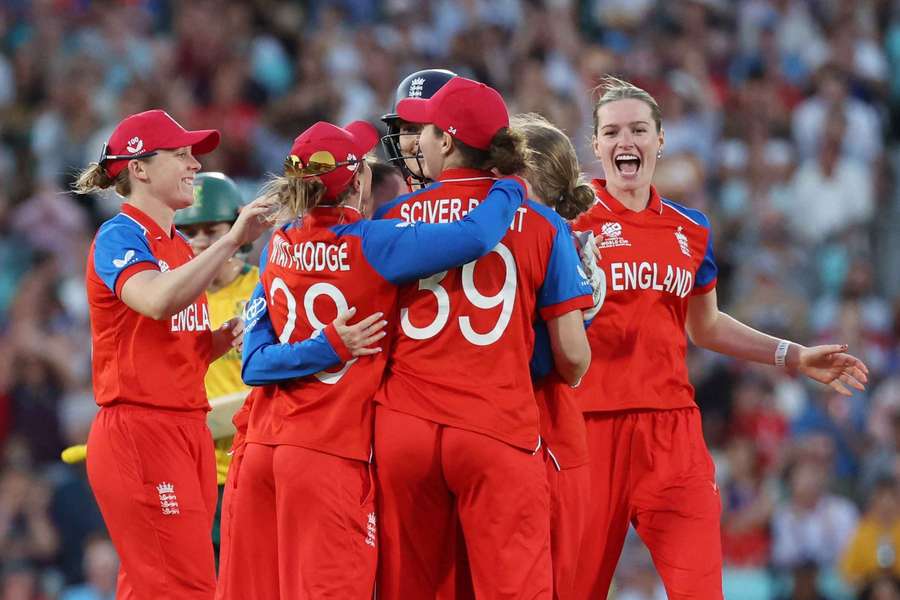 England's Nat Sciver-Brunt celebrates with teammates after taking a catch to dismiss South Africa's Marizanne Kapp England's Nat Sciver-Brunt celebrates with teammates after taking a catch to dismiss South Africa's Marizanne Kapp