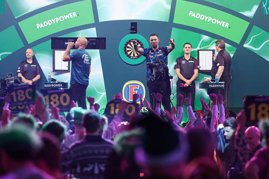 Reigning champion Luke Humphries won his first match at Alexandra Palace