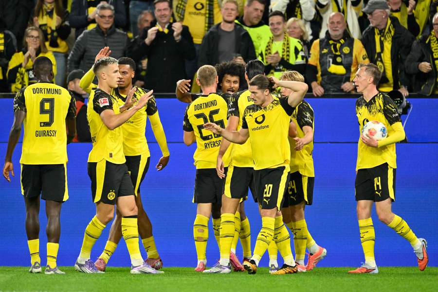 Borussia Dortmund forward Karim Adeyemi (C) celebrates with his teammates Borussia Dortmund forward Karim Adeyemi (C) celebrates with his teammates