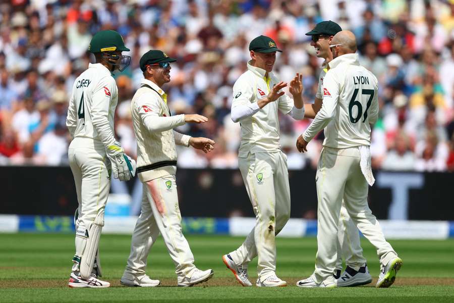 Australia celebrate the wicket of Brook