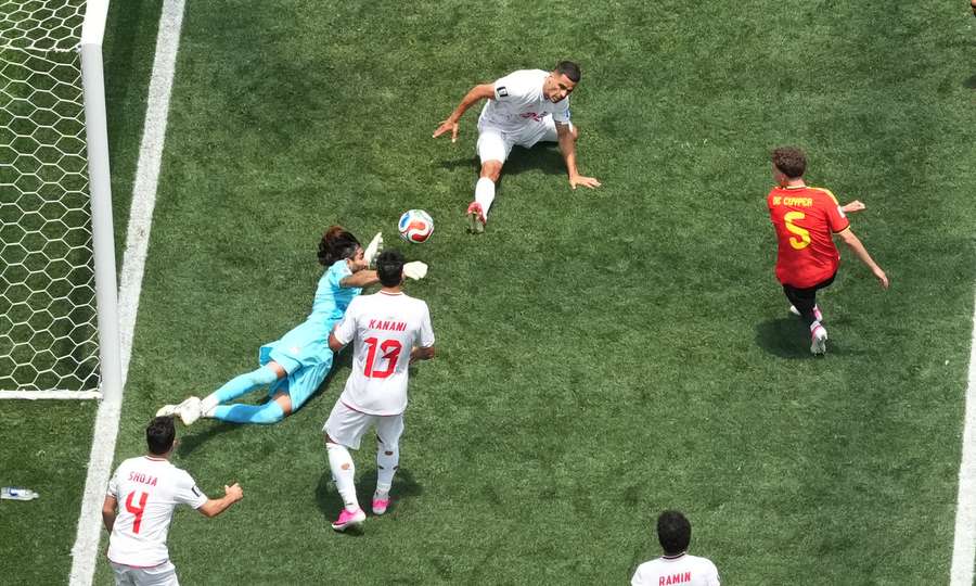 Iran's Alireza Beiranvand makes a save from Belgium's Maxim De Cuyper Iran's Alireza Beiranvand makes a save from Belgium's Maxim De Cuyper