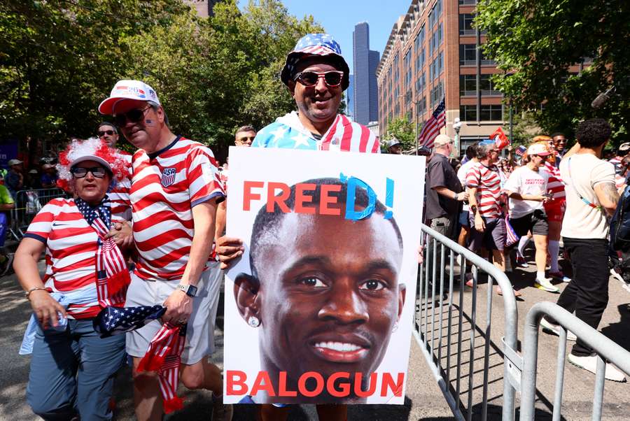 A USA fan holds up a sign in support of Folarin Balogun A USA fan holds up a sign in support of Folarin Balogun