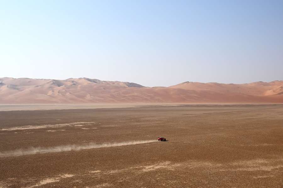 Loeb drives through the sand in Dakar