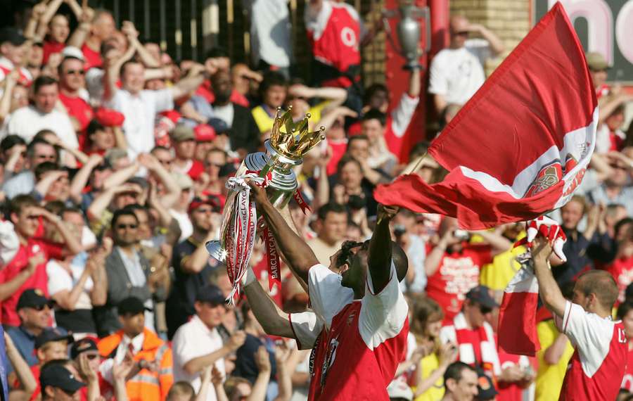 Arsenal's Sol Campbell with the Premier League trophy after going through the season unbeaten in 2004 Arsenal's Sol Campbell with the Premier League trophy after going through the season unbeaten in 2004