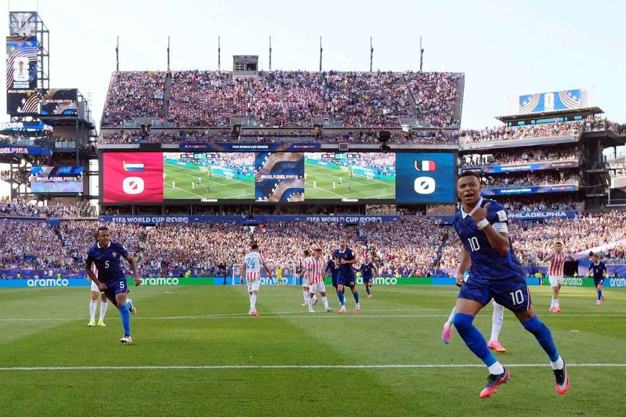 Kylian Mbappe celebrates scoring France's only goal against Paraguay. Kylian Mbappe celebrates scoring France's only goal against Paraguay.