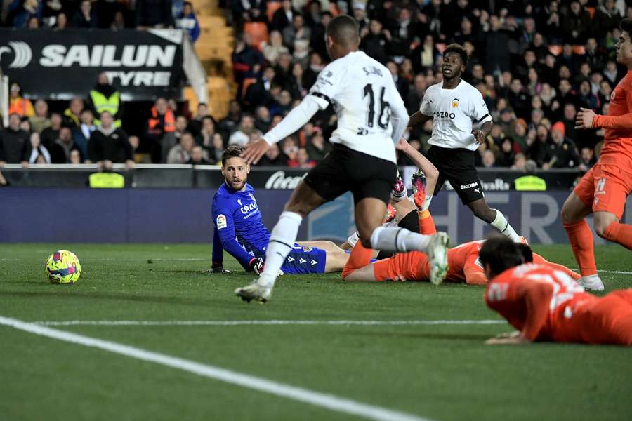 Valencia were the benefactors of an own goal to earn a vital win