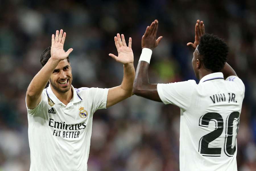 Marco Asensio celebrates after scoring the only goal of the game for Real