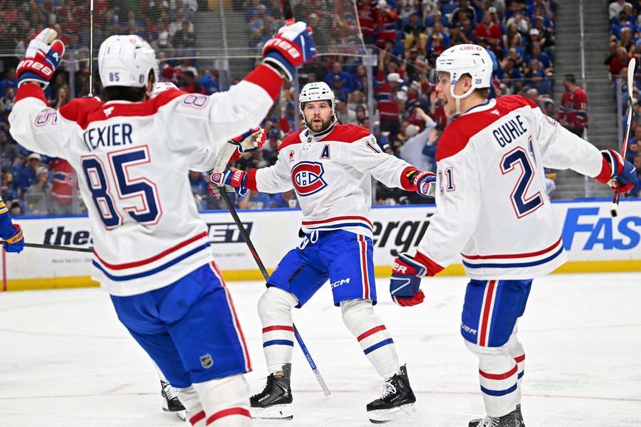Canadiens players celebrate goal in Game 7 against Sabres