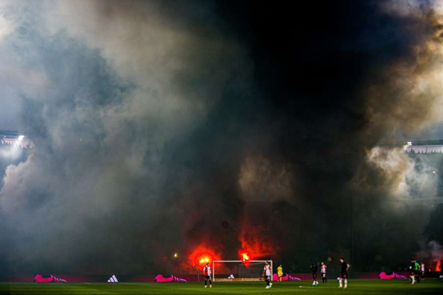 The game was delayed as smoke covered the pitch