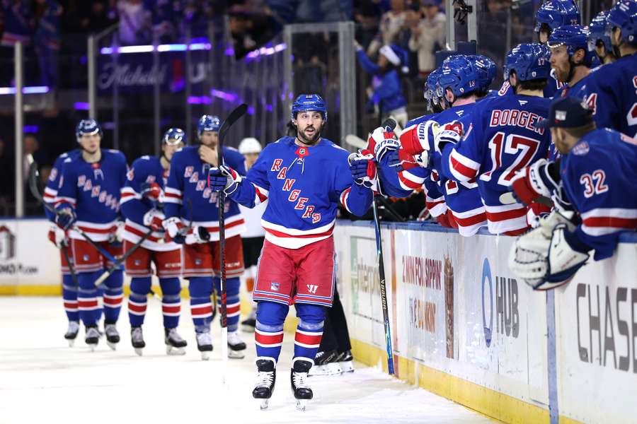 New York Rangers players celebrate a goal against the Philadelphia Flyers (2025)