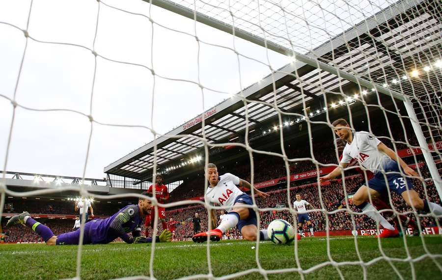 The ball rebounded in off Toby Alderweireld (C) after Hugo Lloris (L) failed to hold it