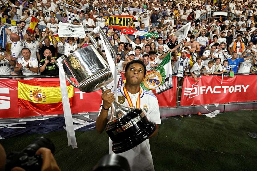 Rodrygo poses with the Copa del Rey trophy