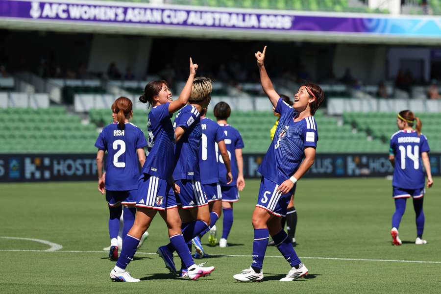 Monoko Tanikawa and Hana Takahashi celebrate Japan's second goal in Perth.