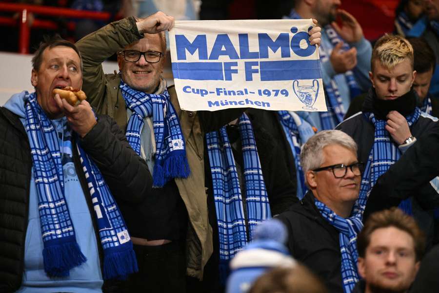 Malmo fans hold up a sign ahead of the Europa League match at The City Ground