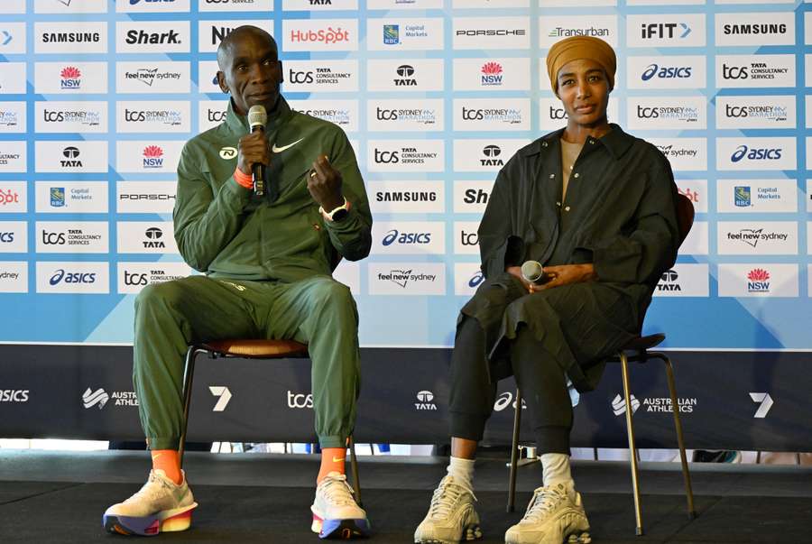 Eliud Kipchoge and Sifan Hassan speak to the media at a Sydney Marathon press conference.