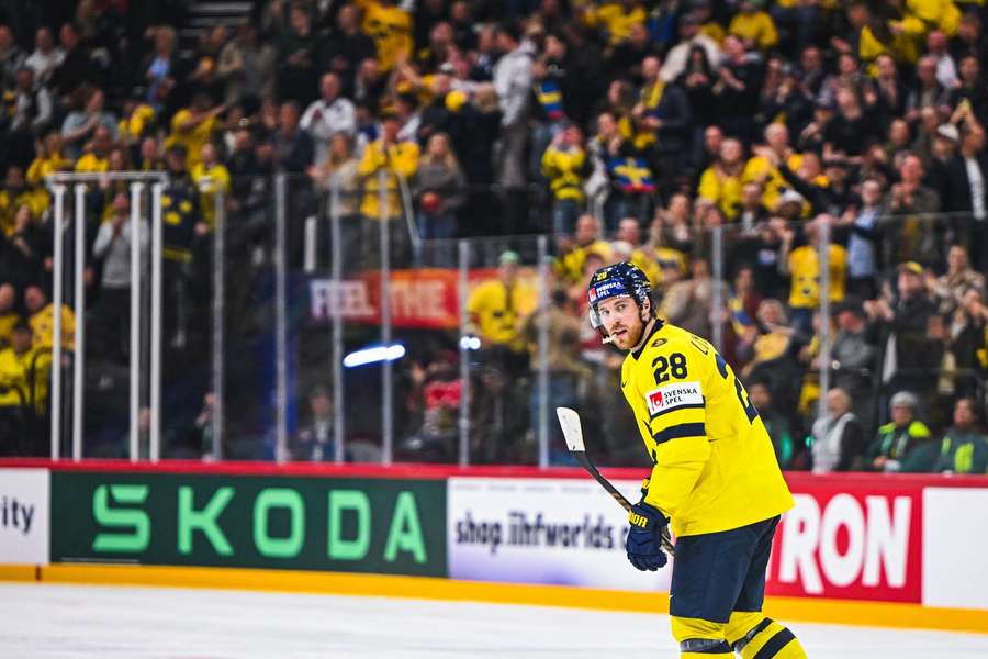 Elias Lindholm receives cheers from the crowd after the second of his three goals Elias Lindholm receives cheers from the crowd after the second of his three goals