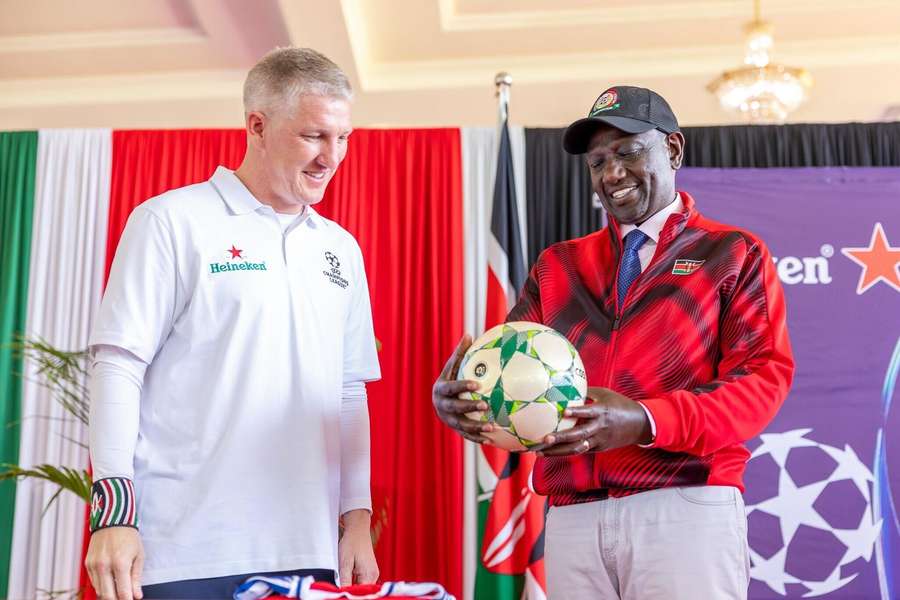 Schweinsteiger (left) recently visited Nairobi to parade the UEFA Champions League trophy