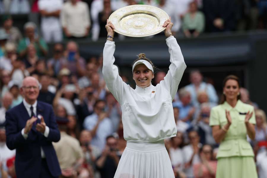 Marketa Vondrousova celebrates with the Venus Rosewater Dish