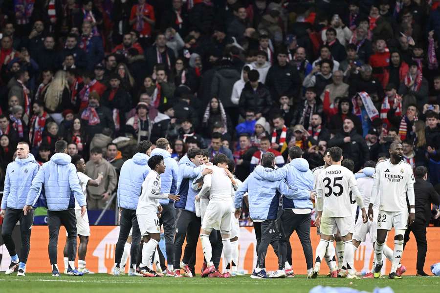 Real Madrid squeezed into the Champions League quarter-finals at the expense of their local rivals