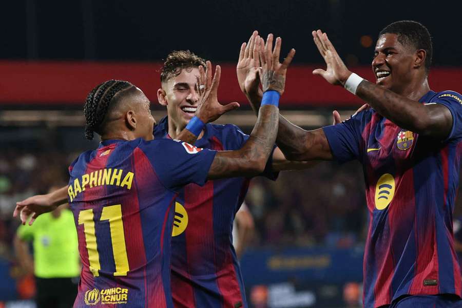 Raphinha and Marcus Rashford celebrate