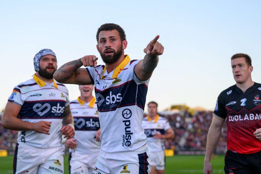 Jacob Ratumaitavuki-Kneepkens of the Hurricanes celebrates a try scored at the weekend.