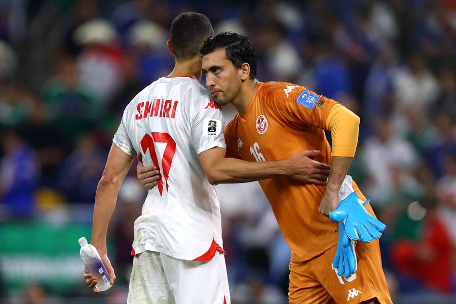 Tunisia's Ellyes Skhiri and Aymen Dahmen look dejected after the loss to Japan Tunisia's Ellyes Skhiri and Aymen Dahmen look dejected after the loss to Japan